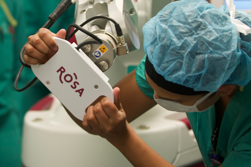 Doctors performing brain surgery